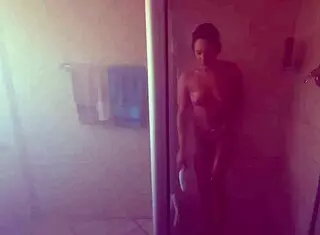 Soaping my pierced nipples tattooed body in shower 😍🧼.