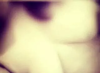 Marlene teases her juicy tits and ass