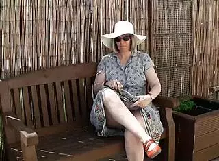 naughty housewife strips naked outdoors garden nature amateur big ass teasing public