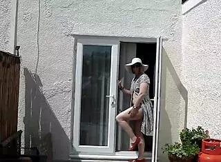 naughty housewife strips naked outdoors garden nature amateur big ass teasing public