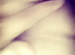 Marlene teases her juicy tits and ass