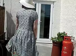 naughty housewife strips naked outdoors garden nature amateur big ass teasing public