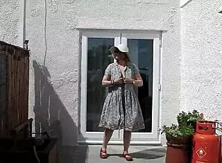 naughty housewife strips naked outdoors garden nature amateur big ass teasing public