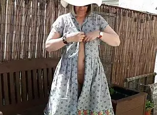 naughty housewife strips naked outdoors garden nature amateur big ass teasing public