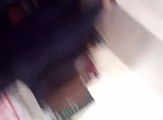 voyeur catches ebony milf ass folding perfectly in shop candid