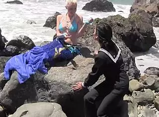 one girl as mermaid kissin the brunette lesbian by sea... so hot omg 😍🌊