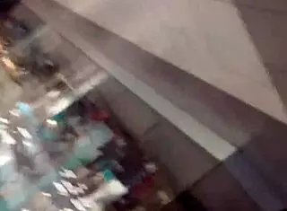 voyeur catches ebony milf ass folding perfectly in shop candid