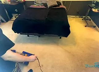 Watch This Busty Housewife Vacuum in Her Bedroom Long Hair Swinging!
