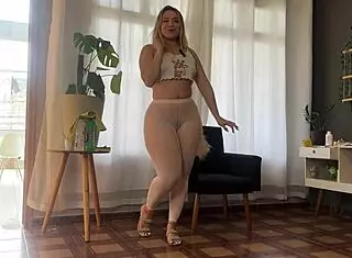 cleaning window in see-thru pants shows hairy pussy feet