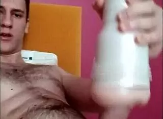 Whoa, pretty boy rams toy deep to explode in cum!