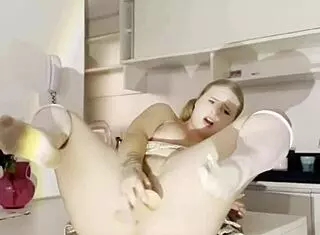 Blonde squirts during anal table fuck