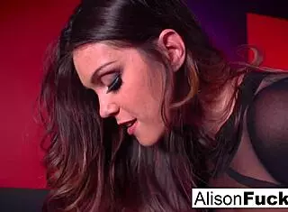 Alison Tyler wields red strap-on in red room lesbian play