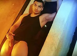 struggling to lift this sexy muscular bodybuilder's monster cock against the wall?