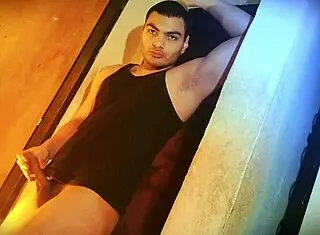 struggling to lift this sexy muscular bodybuilder's monster cock against the wall?