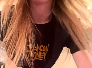 Milf spreads legs and fingers her pink pussy close-up