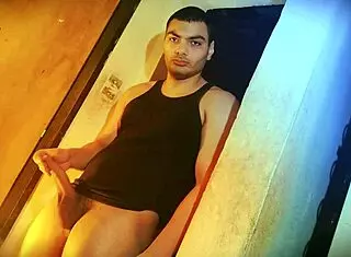 struggling to lift this sexy muscular bodybuilder's monster cock against the wall?