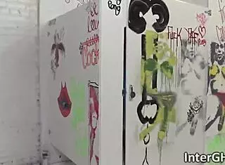 ebony babe fingers pussy while blowing monster cock at gloryhole