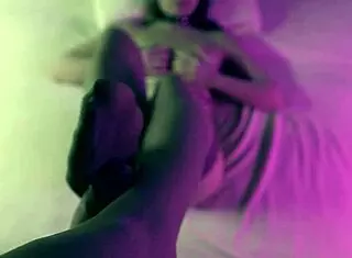 Pretty masked girl gags on huge cock with her feet too!