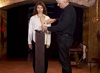 redhead bound and prepped for intense whipping session