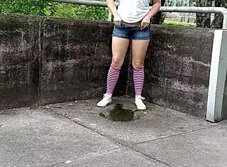Naughty Whore Pisses Pussy in Shorts at Public Hydroelectric Plant Fantasy
