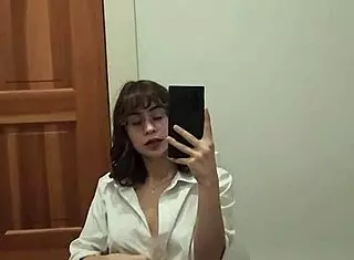 a petite college teen strips her shaved pussy pov