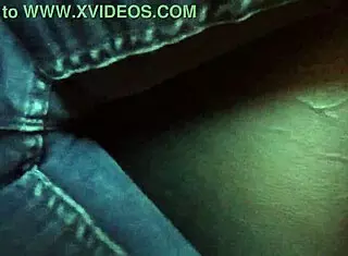 jeans hug her curves while blues play on