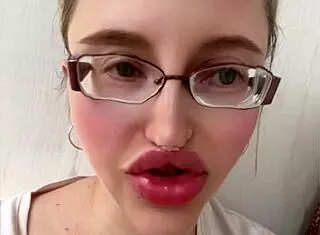 russian blonde glasses long hair huge