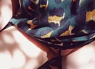 mature blonde's huge shaved cameltoe pussy flashes up close