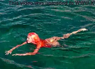 NAKED GIRL FLASHES SHAVED WET PUSSY BY BLUE WATER IN PUBLIC OUTDOOR EXHIBITION!