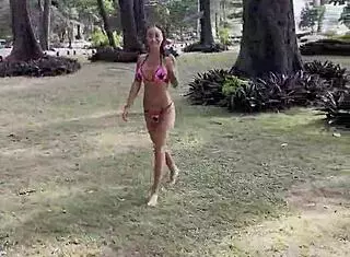 Monika Fox Stuns in Starry Pink Bikini Posing on Beach