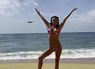 Monika Fox Stuns in Starry Pink Bikini Posing on Beach