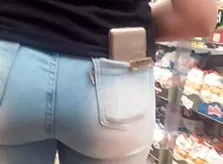 SPYING Juicy Brunette ASS in Tight Jeans at SHOP!