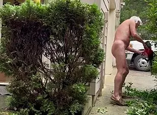 Hey, check out nakedman15 tending his garden completely naked!