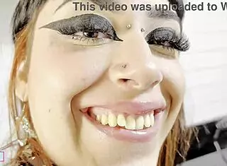 goth chick shoves toy deep in her clit-heavy pussy