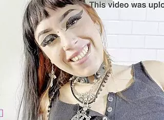 goth chick shoves toy deep in her clit-heavy pussy