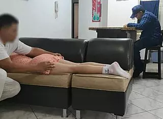 husband's friend sneaks hands under skirt during massage right beside him