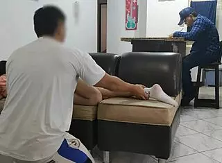 husband's friend sneaks hands under skirt during massage right beside him