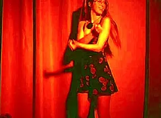 Curvy blonde teases in dress dancing to french tunes