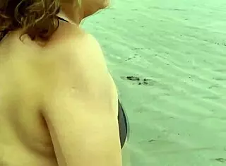 Stepmom flashes beach tits for sneaky pussy cum