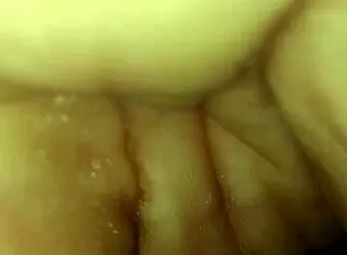 Fingers plunge deep into her tight wet pussy relentlessly