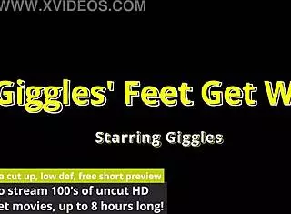 Tattooed black babe giggles strutting big natural tits feet in heels close-up