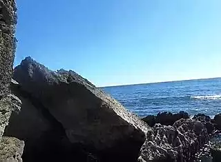 african beach prostitute's thick ass exposed