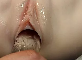 her shaved pussy takes double fake cocks in close-up fuck doll fetish play