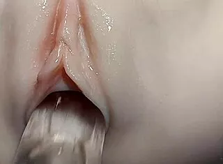 her shaved pussy takes double fake cocks in close-up fuck doll fetish play
