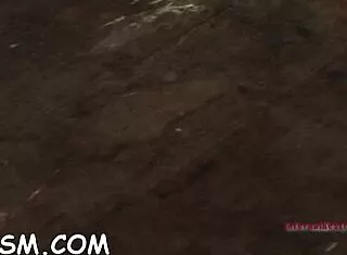 seductive beauty in metallic helmet surrenders shaved pussy to rough bdsm drilling contest