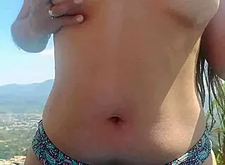 hot latina milf sucks boyfriend's cock poolside at cabin