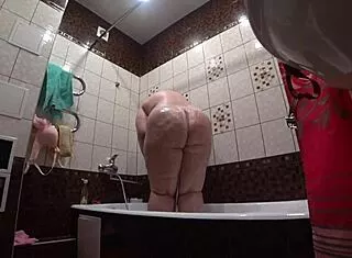 hidden cam boldly spies fat model's huge ass showering