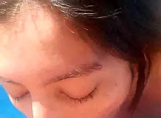 hot latina milf sucks boyfriend's cock poolside at cabin