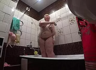 hidden cam boldly spies fat model's huge ass showering