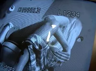 A gloryhole cock unloads deep in Riley's pretty mouth